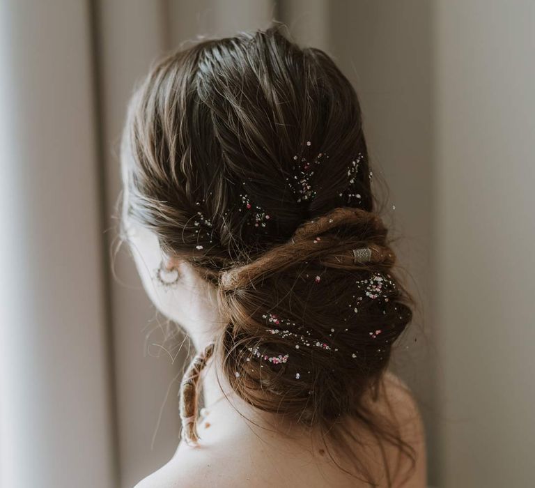 Bride in strapless wedding dress and sparkly glitter wedding hair 