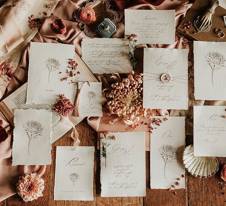 Classic hand drawn wedding stationery suite with aged paper for luxury vibes at country house wedding 