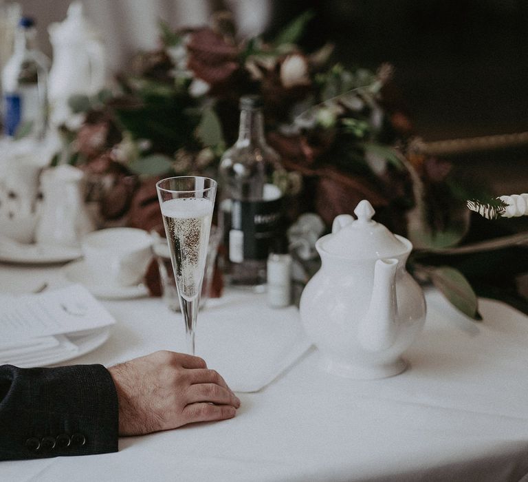 Champagne flute at intimate wedding reception 