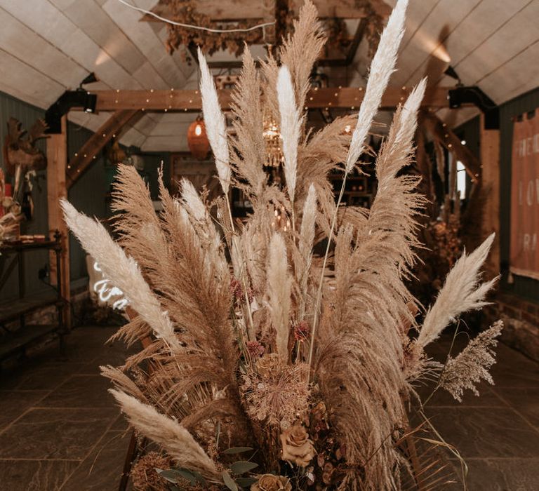 Huge pampas grass centrepiece for wedding reception