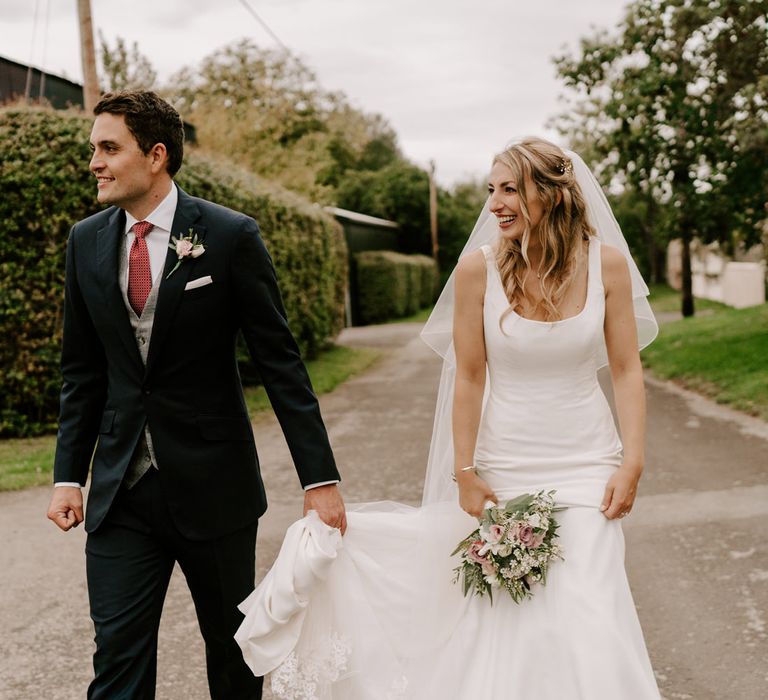 Bride and groom portrait at Clock Barn wedding venue in Hampshire 