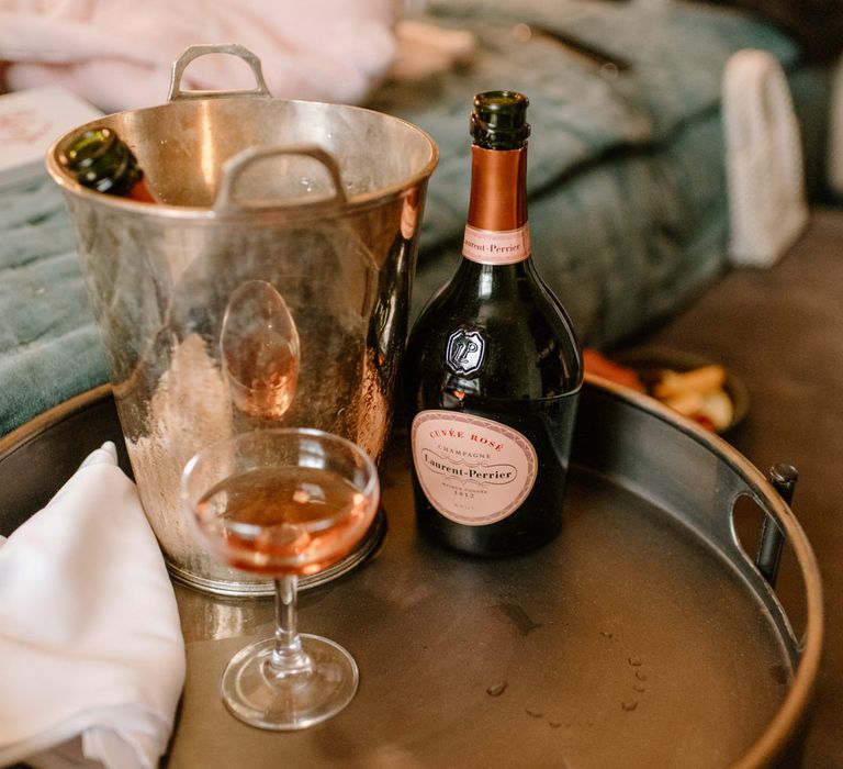 Laurent perrier wedding day champagne with champagne couple and rose gold champagne bucket