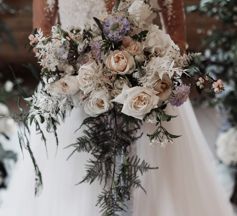 White, pink and lilac flowers were used for a soft, romantic colour palette