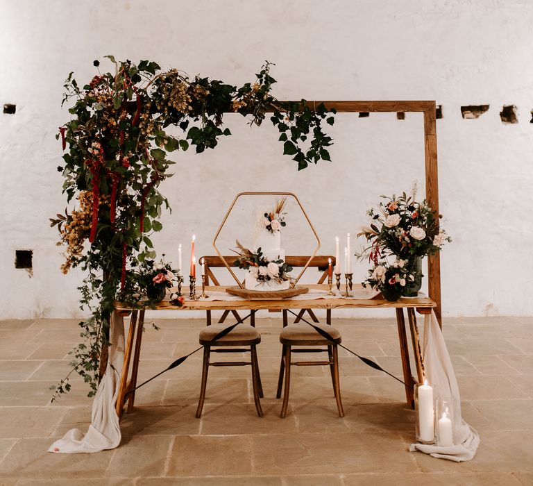 Beautiful wedding cake on geometric stand