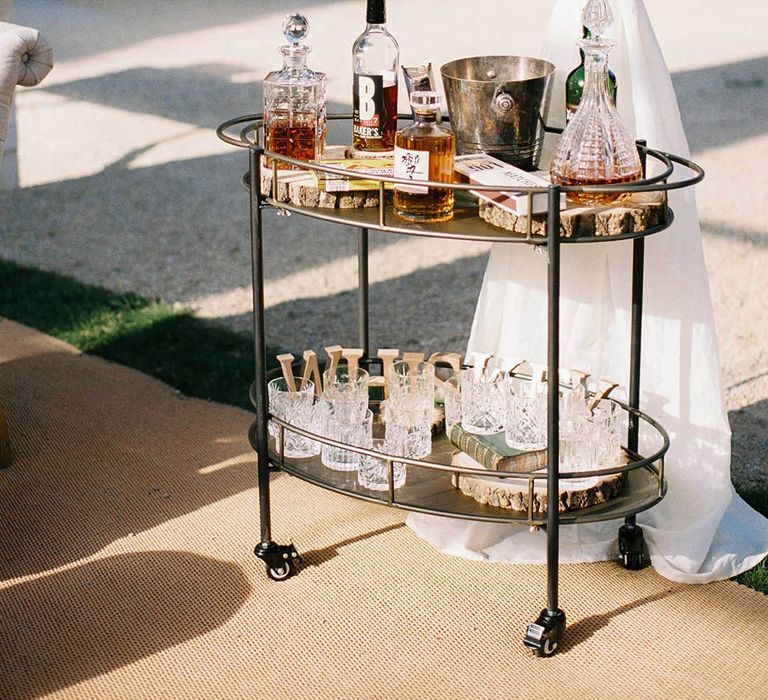 gold drinks trolley at outdoor wedding