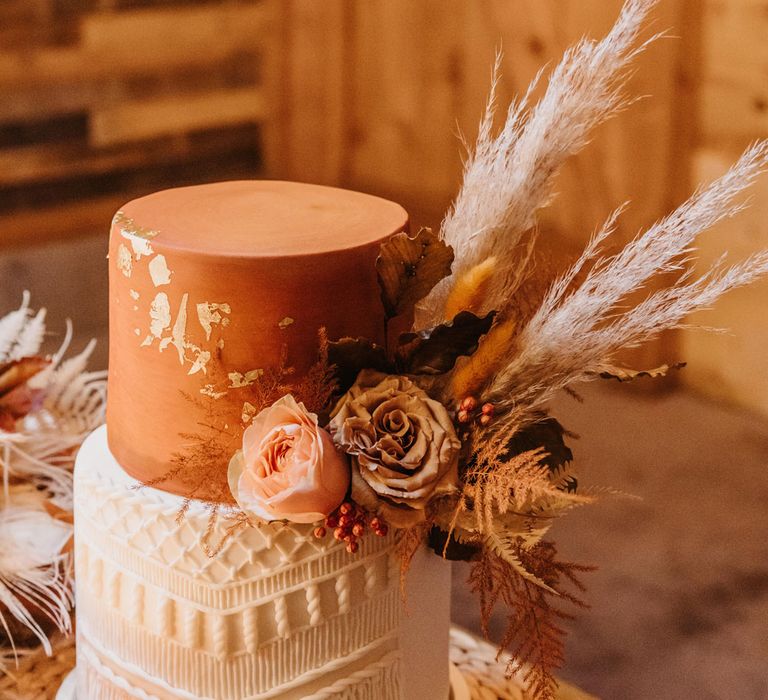 Two tier boho wedding cake with macrame detailing and rose and pampas grass decor for boho wedding in Scotland