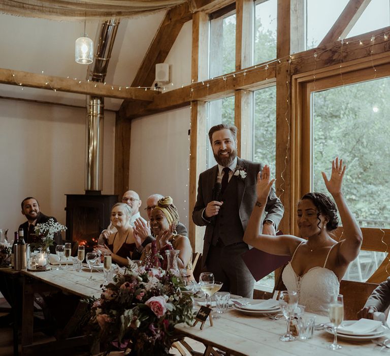 Best man gives speech during wedding reception