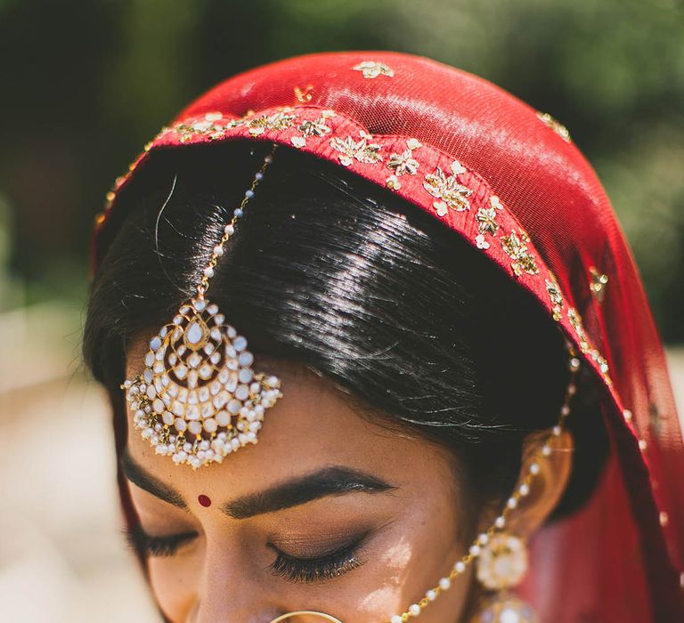 Beautiful close up wedding photography showing an Indian Bride's jewellery details