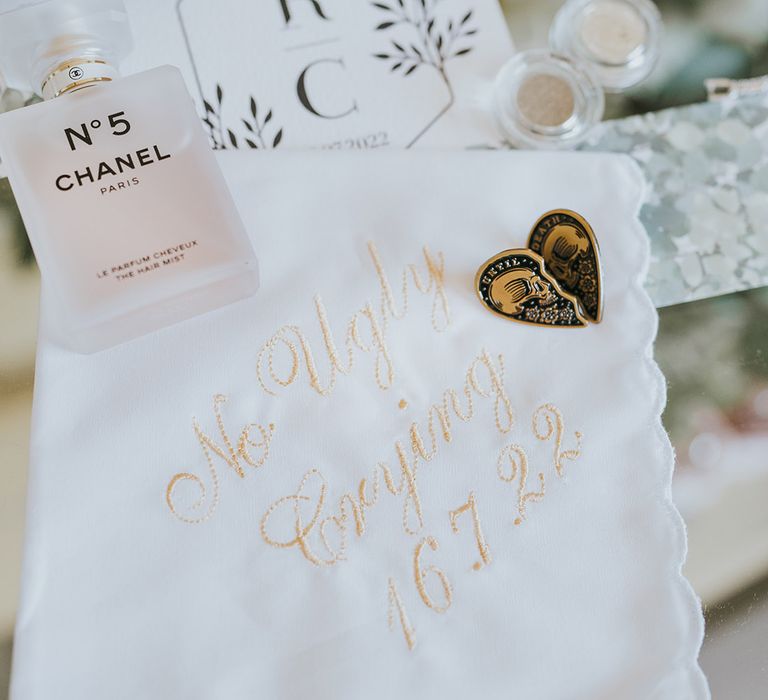 Embroidered white pocket square handkerchief with gold heart pins, Chanel perfume and the black and white minimal DIY stationery 