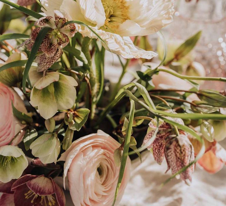 White peony, pink garden rose, foliage and blush florals wedding table centrepiece at Euridge Manor 