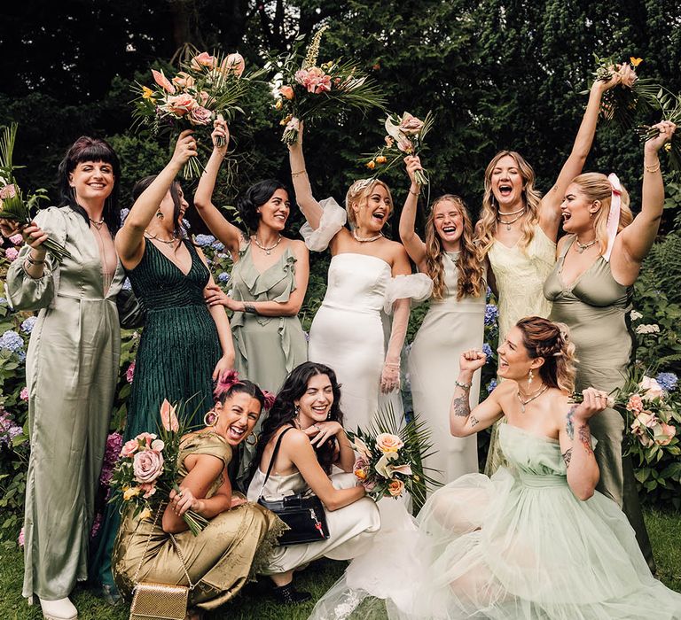 Wyresdale Park wedding with green wedding theme as the bridesmaids all wear mismatched green bridesmaid dresses