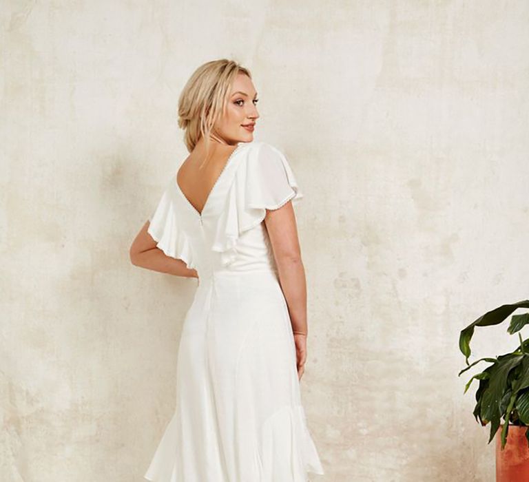 Sustainable wedding dress with waterfall ruffles from Indiebride London in boho style