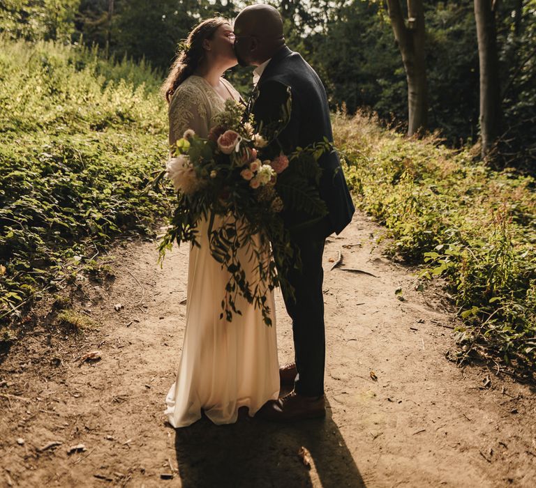 Bride and groom golden hour portrait by The Chamberlains at CS Lewis House in Oxford 