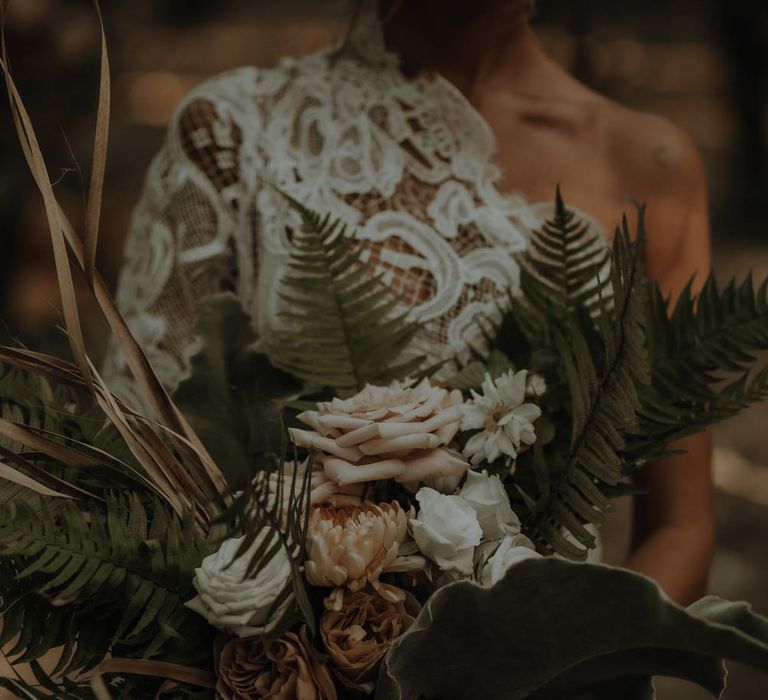 Boho wedding bouquet with green ferns and dusky pink roses 