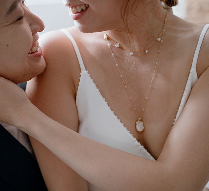 Bride in layered bridal necklaces 