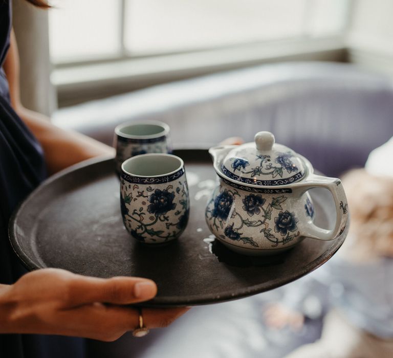 Chinese tea ceremony with blue and white family tea set