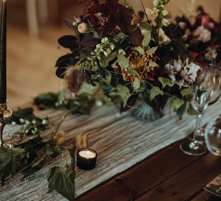 Autumnal bouquets set on wooden table 