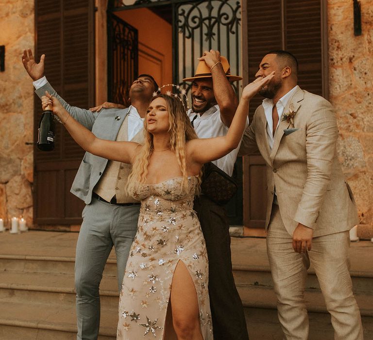 Bride & groom dance with wedding guests on their wedding day