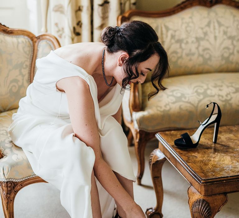 Bride does up her heels on her wedding day