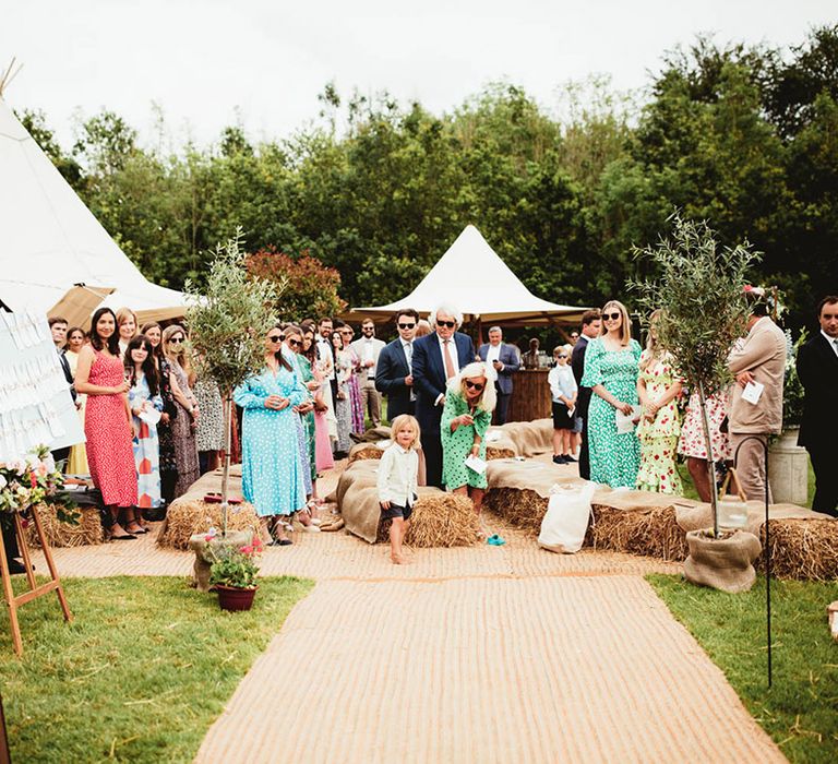 Festival styled wedding complete with hay bales