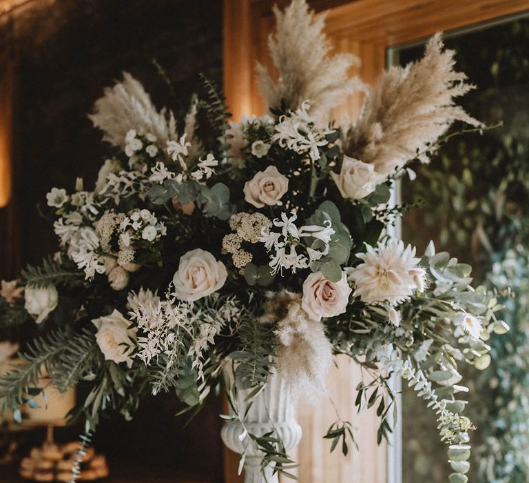 Blush wedding flowers with pampas grass