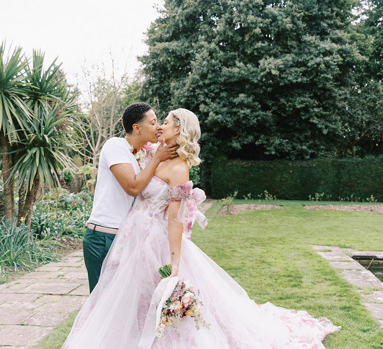 LGBTQI+ wedding inspiration at Barnett Hill Hotel with bride in a pink flower wedding dress 