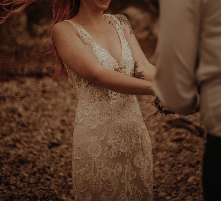 Bride in lace wedding dress at intimate elopement