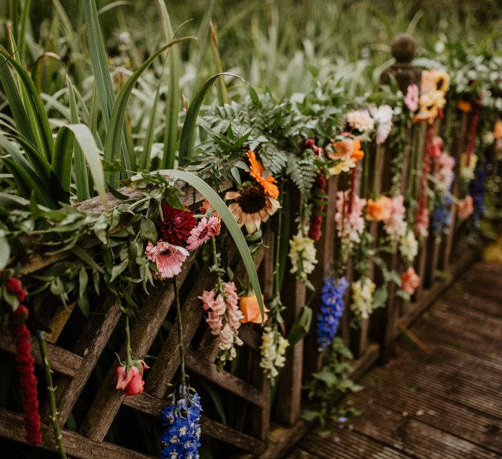 colourful flowers and wedding decor for rainbow wedding