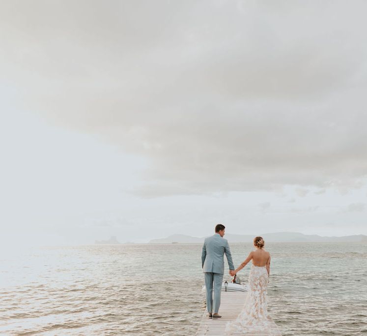 Bride and groom at pink and blue wedding in Spain