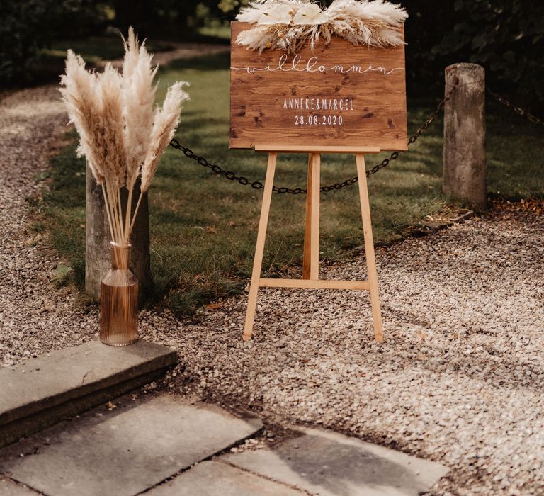 Rustic wedding sign with pampas grass