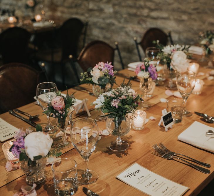 Table setting with bouquets used as floral decor