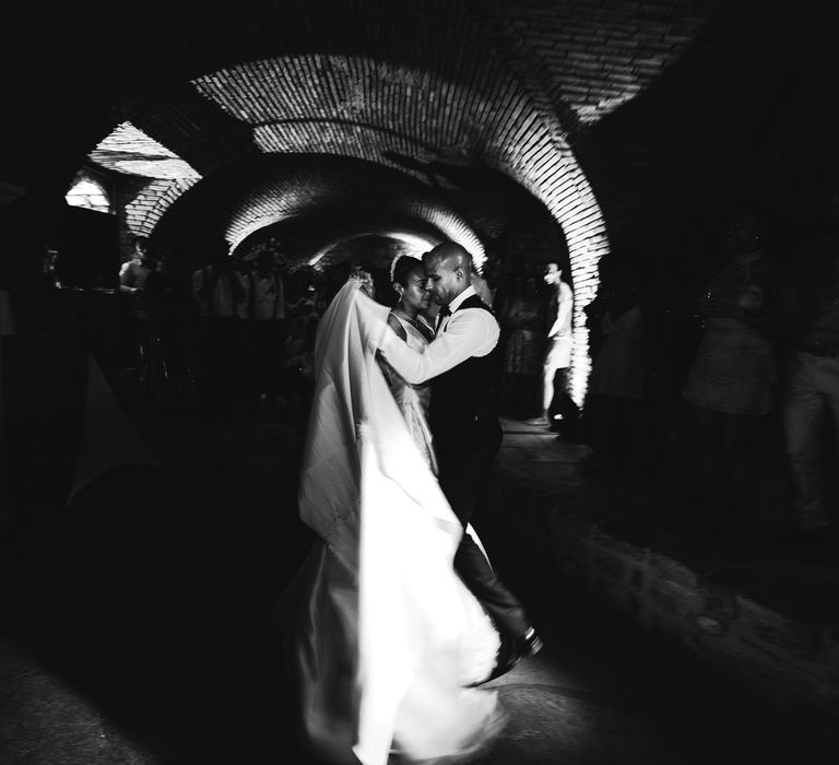 The bride and groom sharing their first dance