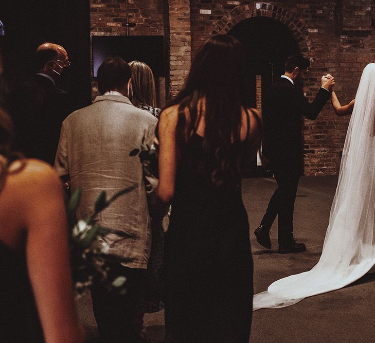 Bride and groom just married at industrial, Gas Street Church wedding ceremony 