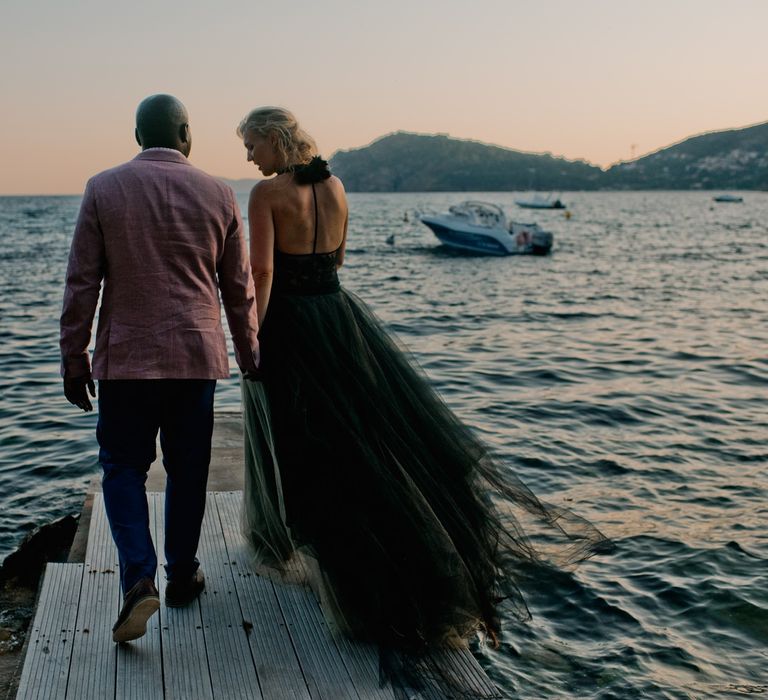 Bride in Vera Wang black wedding dress with groom at French wedding