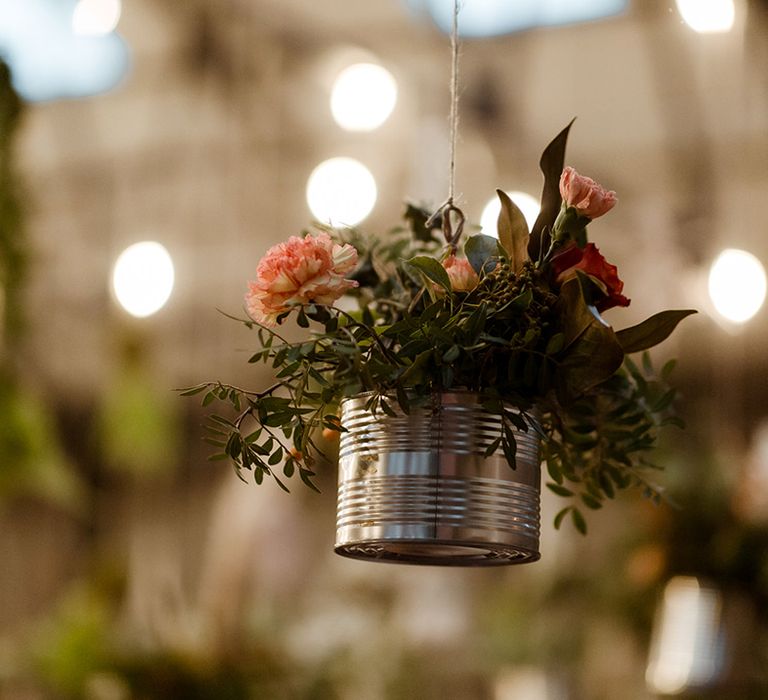 Close-up of the DIY hanging plant decor for boho industrial wedding at a warehouse