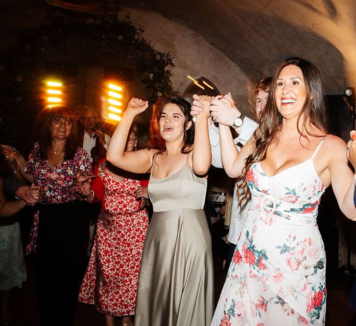 Guests dance during Scottish reception with Ceilidh band