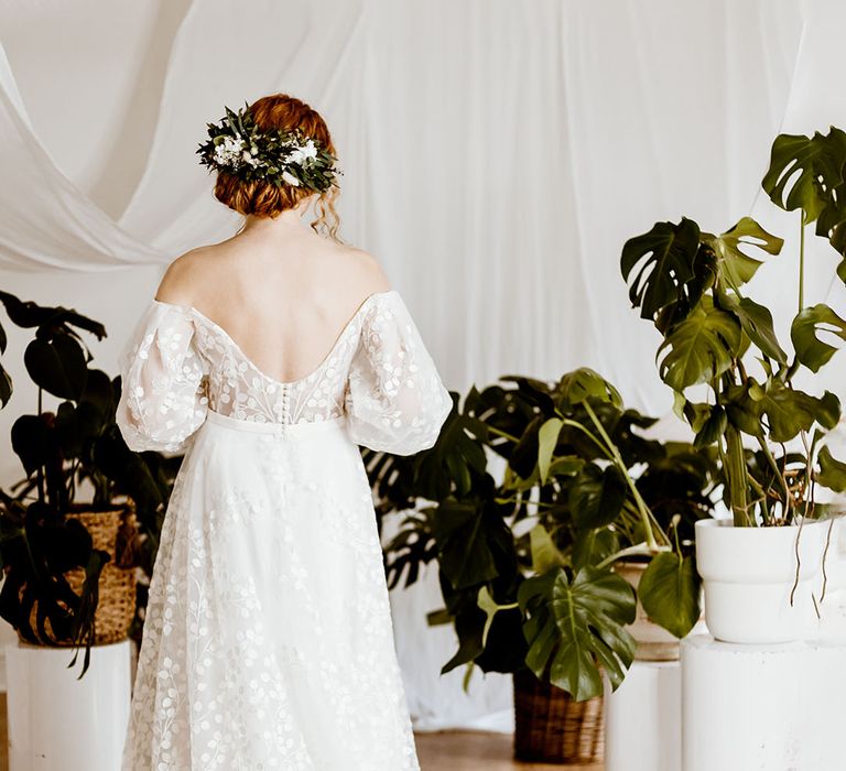 appliqué wedding dress and flower hair accessory by Luna & Wild