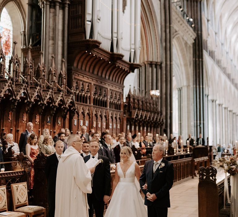 Epic cathedral wedding with traditional stained glass windows and more 