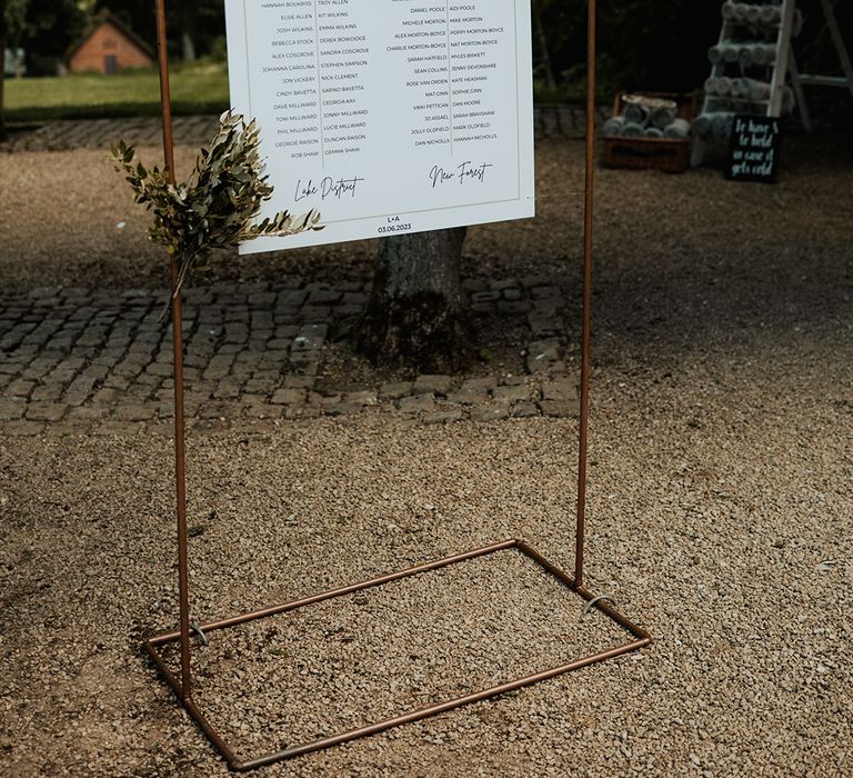 Minimalist black and white wedding sign table plan 