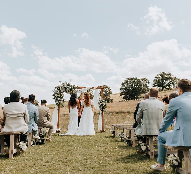 Outdoor wedding ceremony at Lyde court with two brides for same sex wedding 