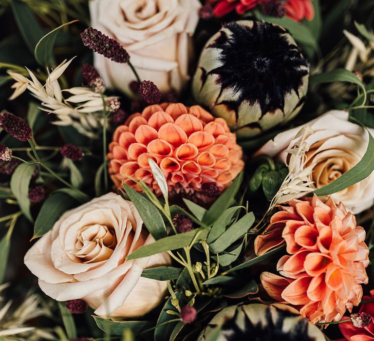 Dahlias and roses in colourful pink neutral wedding bouquet 