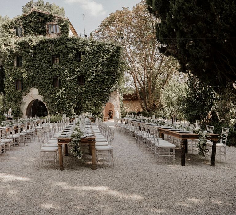 Stunning villa in Italy set up for outdoor wedding breakfast 