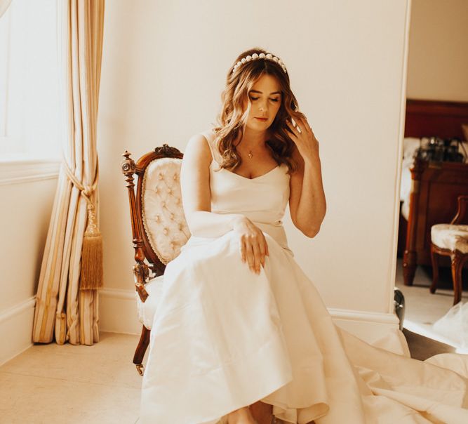 Bride to be wearing Kacey Wedding Gown by Chantel Lauren with Pearle Asos Headband