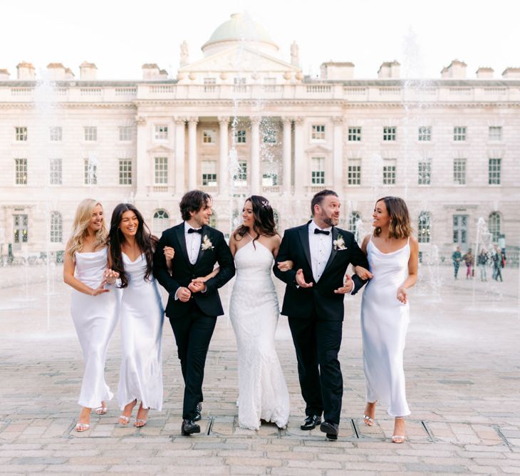 Wedding party at Somerset House with water fountains as the backdrop