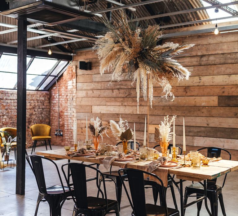 Industrial table and metal chairs at The Shack Revolution 