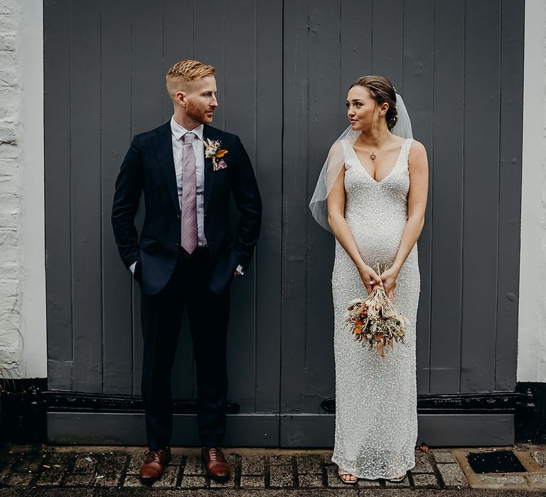 Pregnant bride and groom portraits at micro wedding in London 