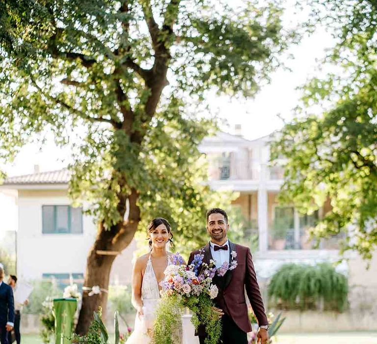 Outdoor wedding ceremony in Italy for Bride and Groom