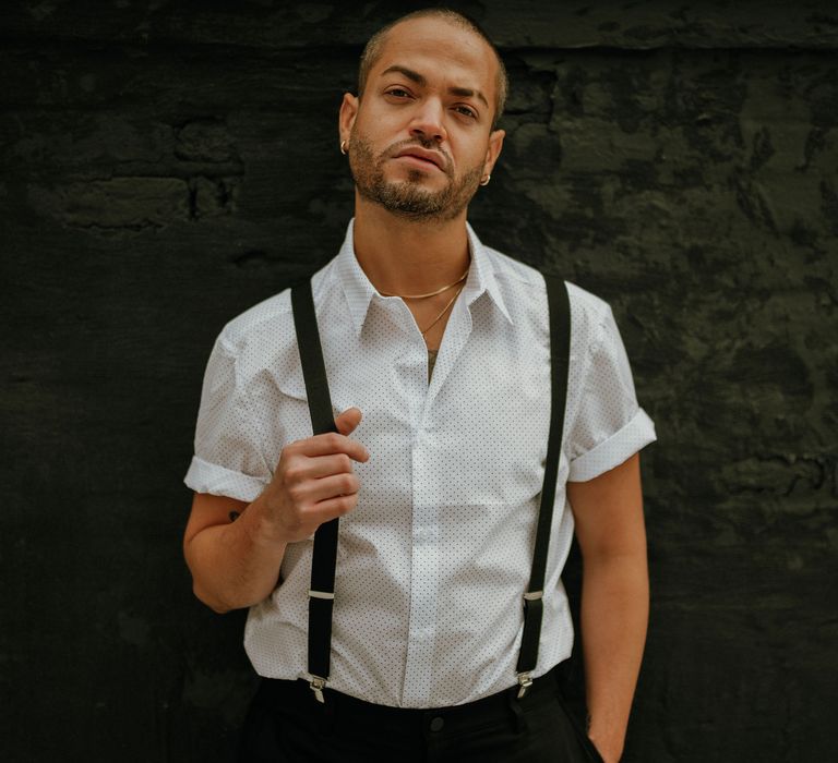 Groom in short sleeve spot shirt with braces