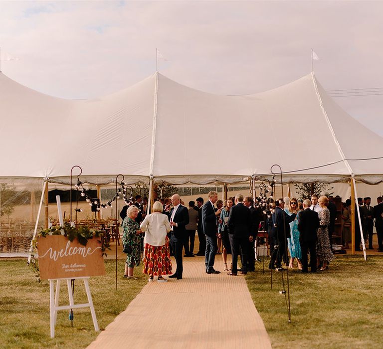 Rustic wedding at White Pond Farm with wooden signs