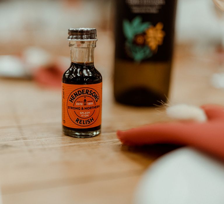 Mini bottles of Henderson's Relish on the tables for the wedding guests